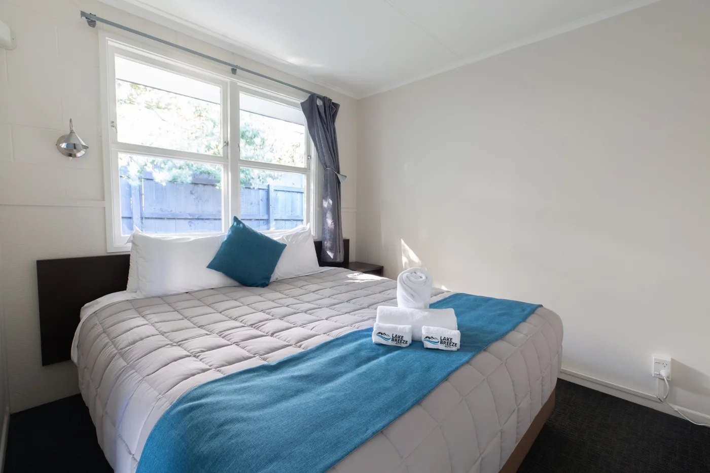 Main bedroom in the Two-Bedroom Apartment at Lake Breeze Motel