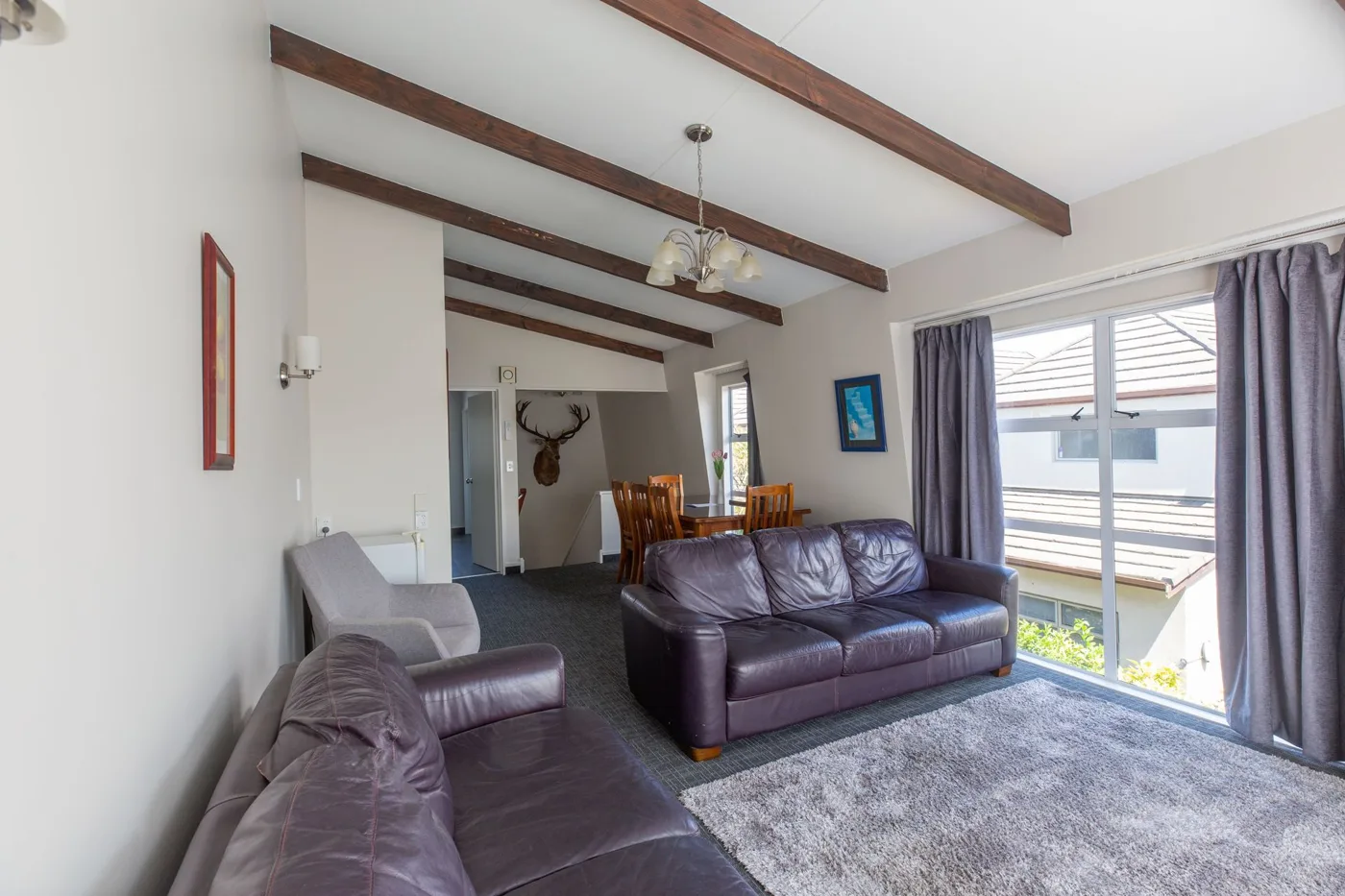 Sofa and living space in the Lake View Apartment at Lake Breeze Motel