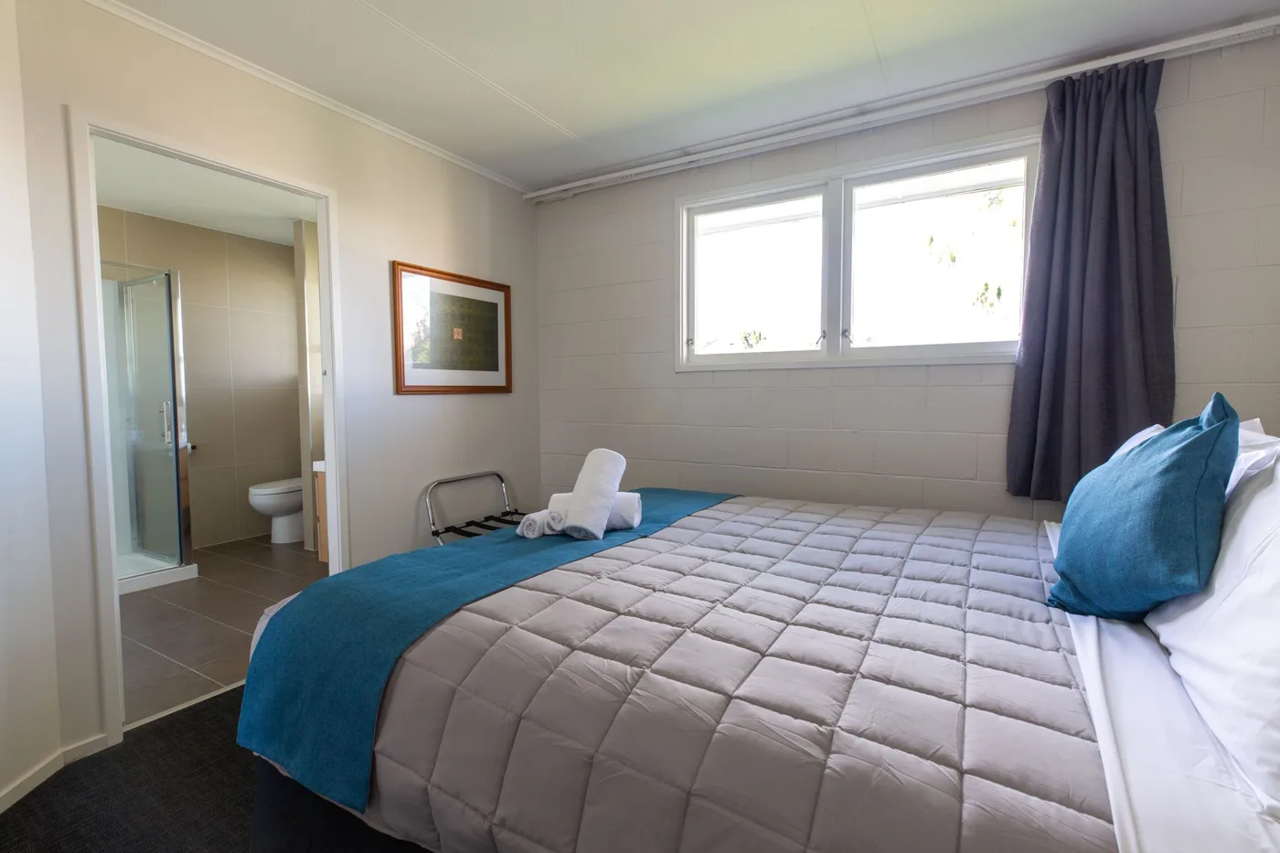 Main bedroom in the Playroom Apartment at Lake Breeze Motel
